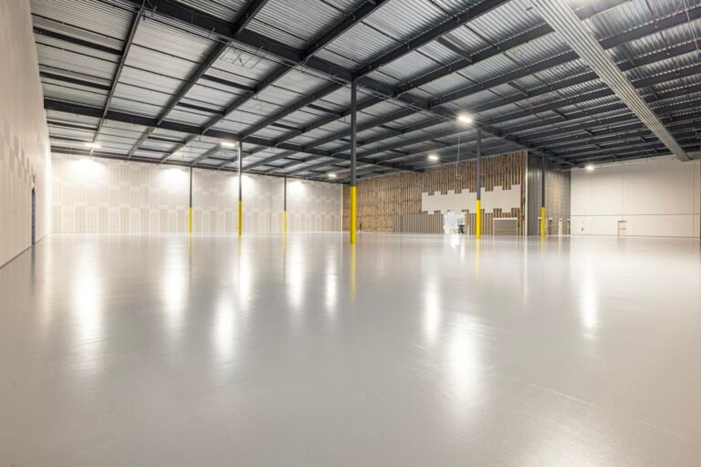 Industrial warehouse with a clean concrete floor – industrial cleaning
